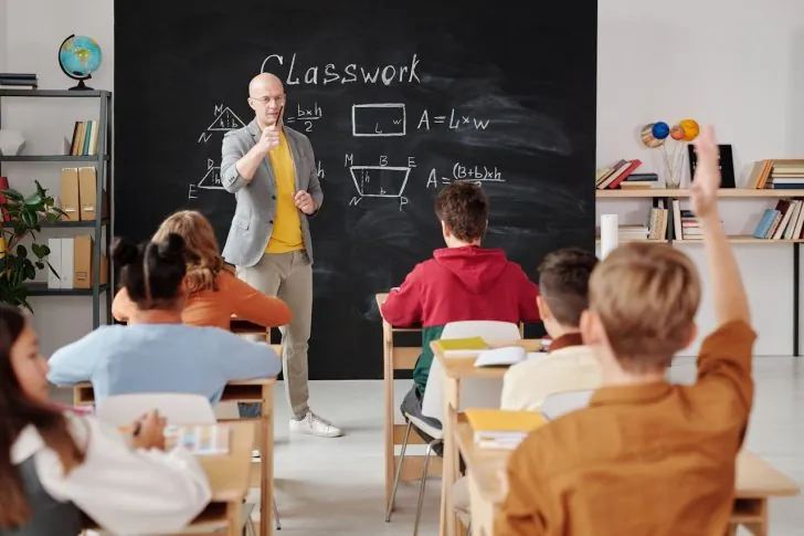 A diverse classroom with students from different countries engaged in a learning activity, representing global classroom adventures.